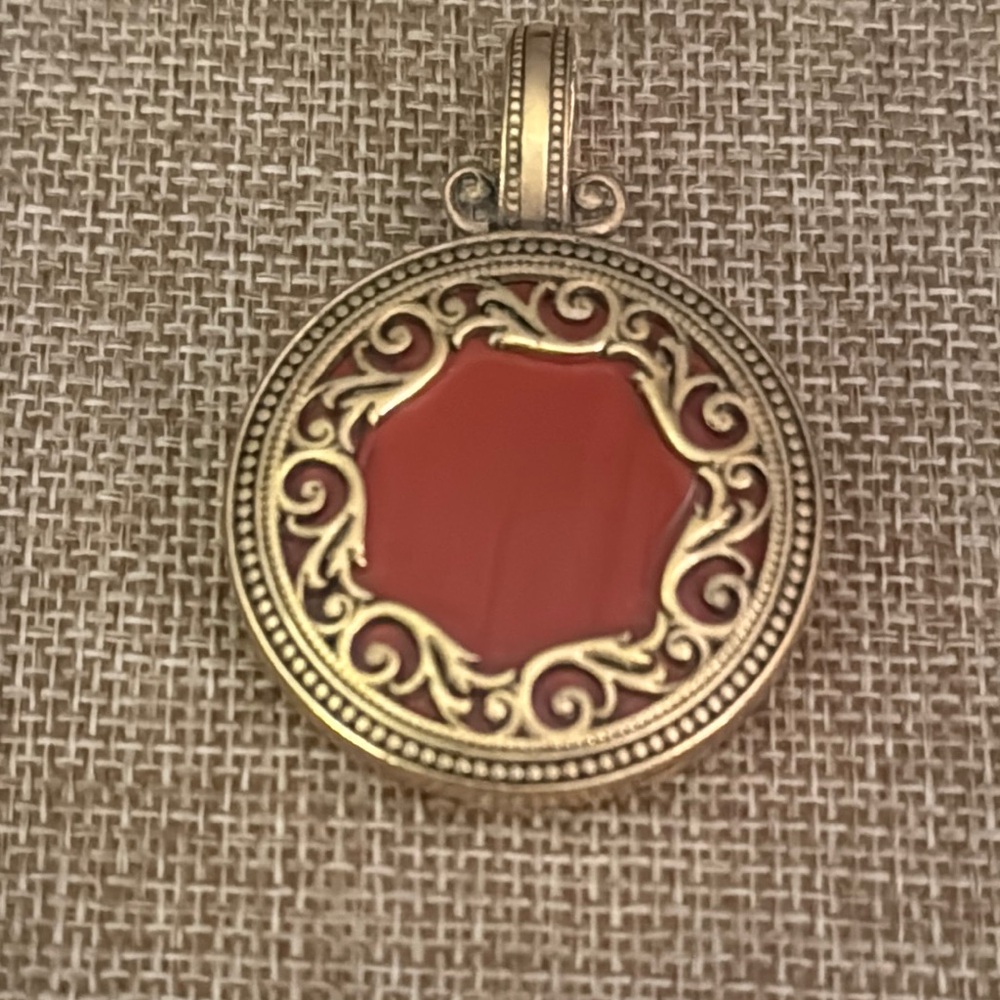 Elegant Gold and Red Pendant